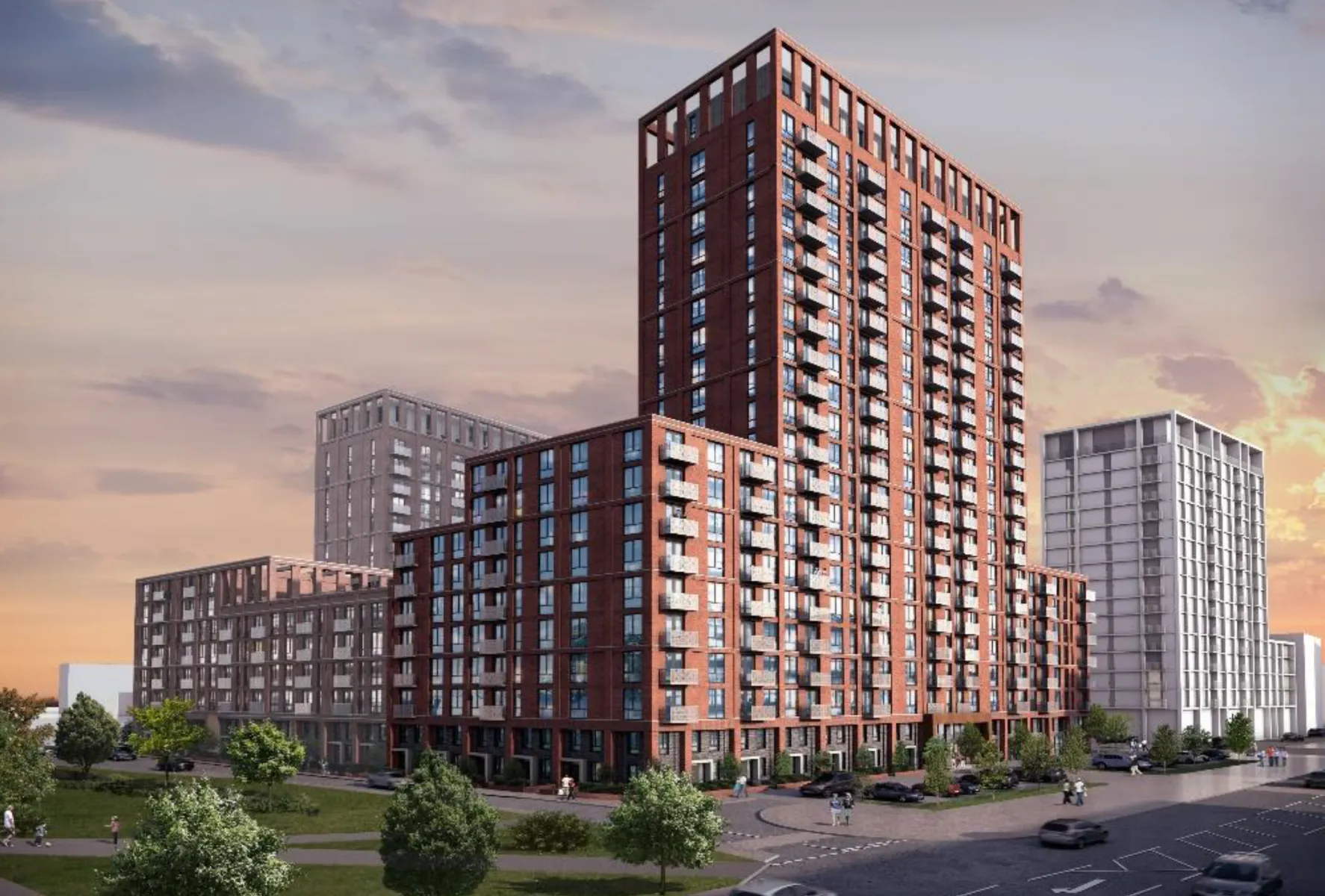 High-rise residential building with sunset sky